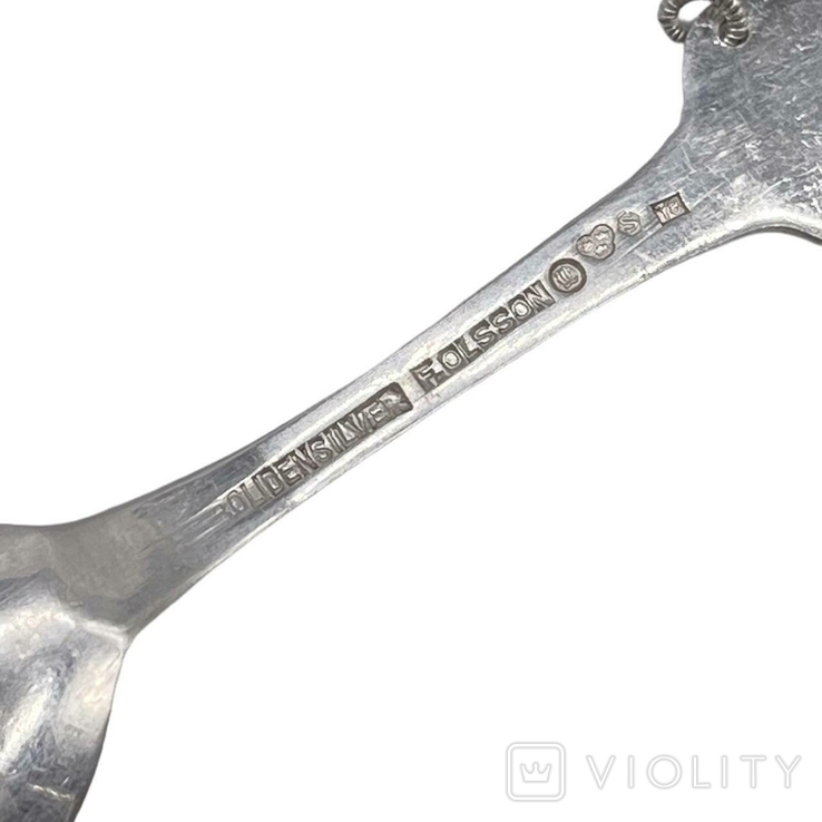 A set of silver spoons and sugar tongs of the Sámi (Lapland) people ...