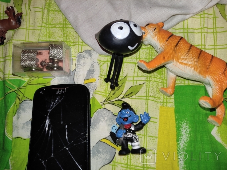 Іграшки, запонки, розбитий телефон, фото №3