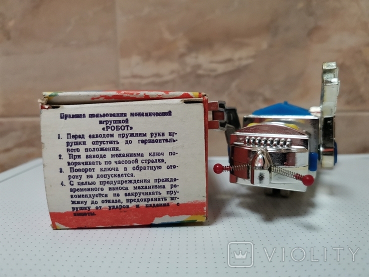 Робот заводна іграшка 15,5 см робоча - 11, фото №4