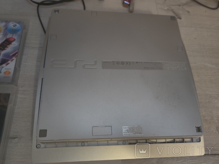 Sony playstation 3 SLIM SILVER 1 TB ПРОШИТА HEN + Море игр + 2 Джойстика + Аксесуары, фото №2