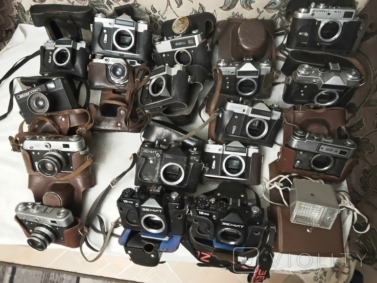 4 фотоаппарата, вспышка и 13 тушек, фото №2