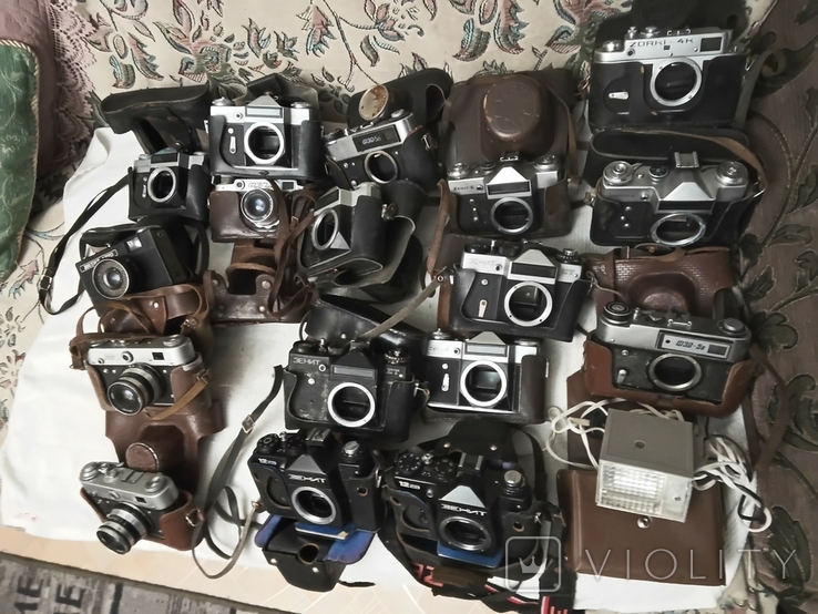 4 фотоаппарата, вспышка и 13 тушек, фото №3