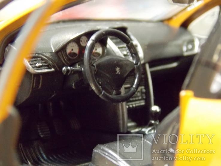 1:24 Burago Peugeot 207, фото №7