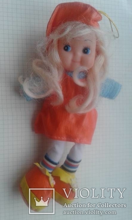 Кукла в оранжевом