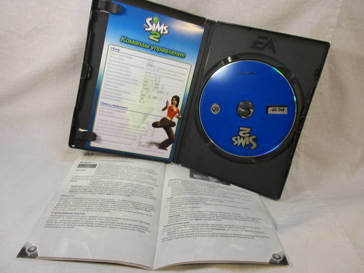 Два диска на ХВОХ и диск на ПК Sims 2 с руководством и кнопками управления, фото №6