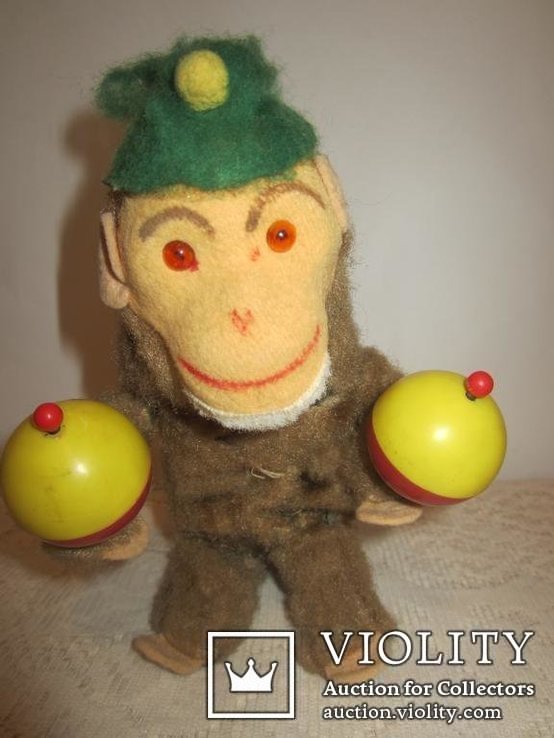Заводная обезьяна с погремушками Германия, фото №4
