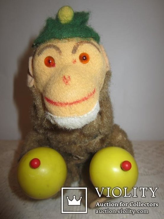 Заводная обезьяна с погремушками Германия, фото №5