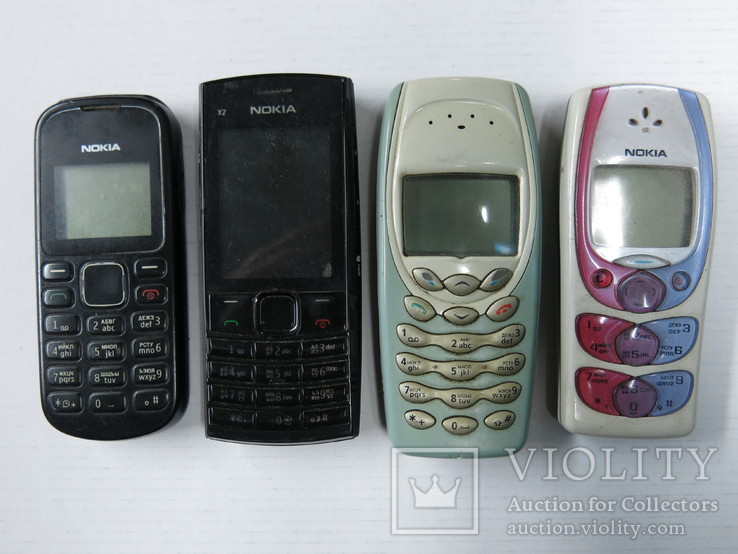 Четыре мобильных телефона, фото №2