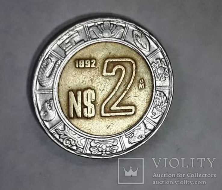 Мексиканское песо. монеты номиналом 2 песо. Брак чеканки, чужая гуртовая надпись