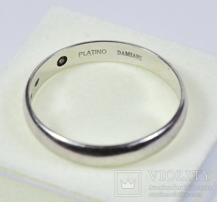 Брендовое обручальное кольцо из платины Damiani c бриллиантом