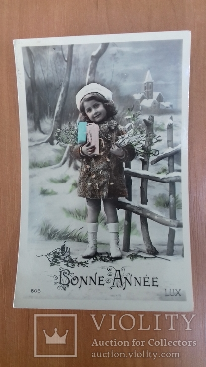 Открытка Франция. 1912 г. Девочка с подарками. С новым годом. Цветы. Дети