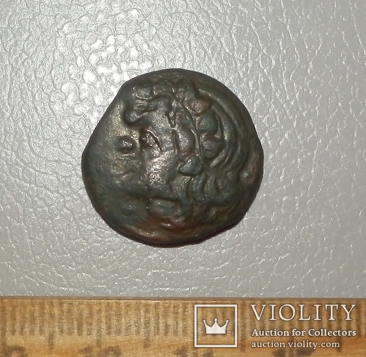 Монета Боспорского царства с изображением Сатира