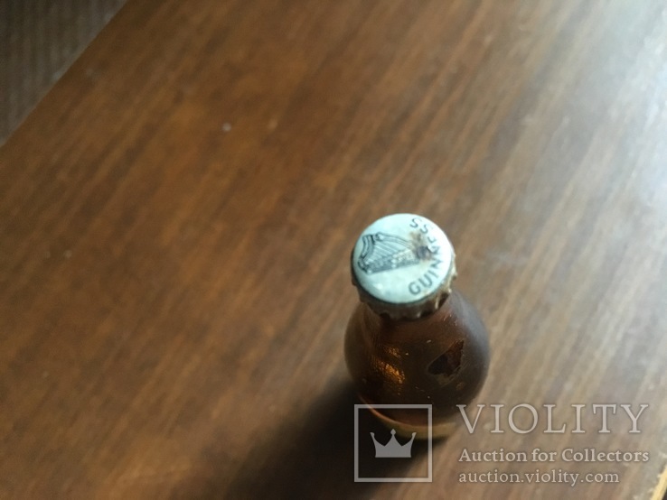 Сувенирная бутылка пива Guinnes запечатана винтаж, фото №4