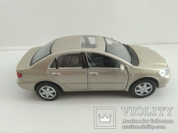 Toyota Corolla 1/36 Kinsmart, photo number 3