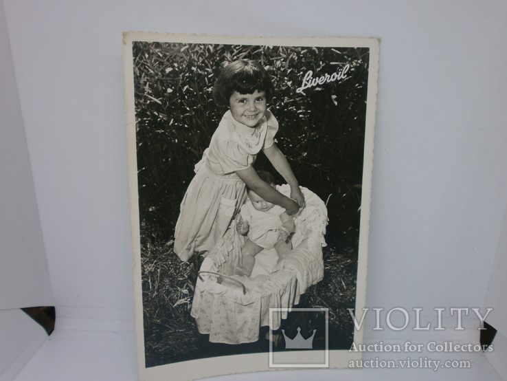 Открытка Франция. Девочка с куклой в коляске. На обороте реклама, фото №2