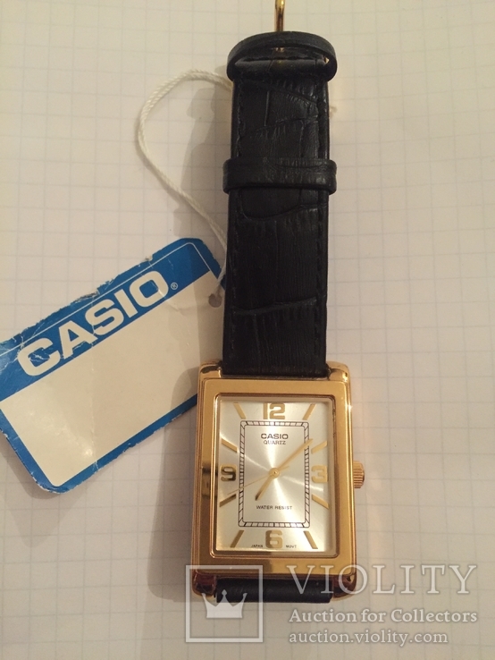 Лот 0082 Новые мужские часы Casio (оригинал) MTP-1234GL-7AEF