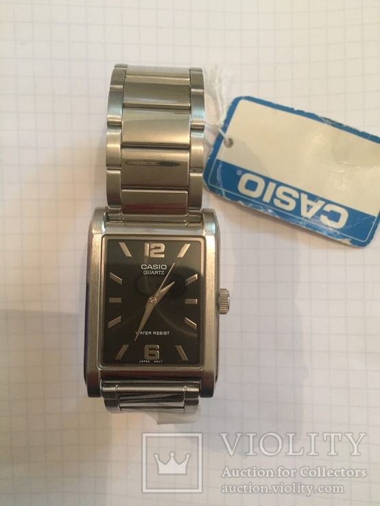 Лот 0103 Новые мужские часы Casio (оригинал) MTP-1235D-1ADF