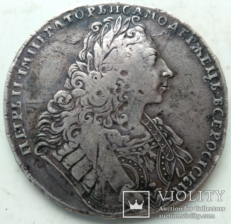 Монета Рубль 1729-го года ( Портрет с орденской лентой  ).