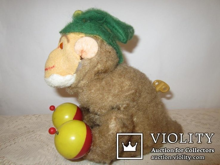 Заводная обезьяна с погремушками Германия, фото №3