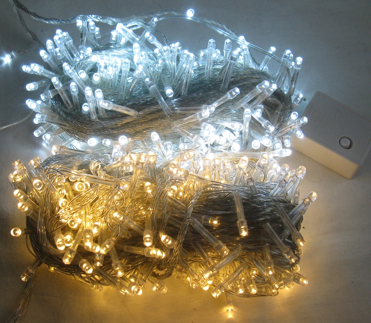 Гирлянда тепло белый цвет , 300 ЛЕД лампочек , 25 м. , белый кабель ., фото №4
