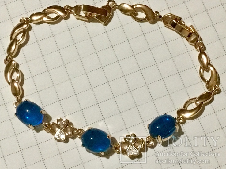 Позолоченный браслет 18 ct с голубыми кристаллами