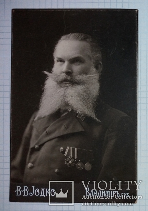 Фото служащего Российской империи с орденом и медалями, 16 августа 1912 года, фото №2