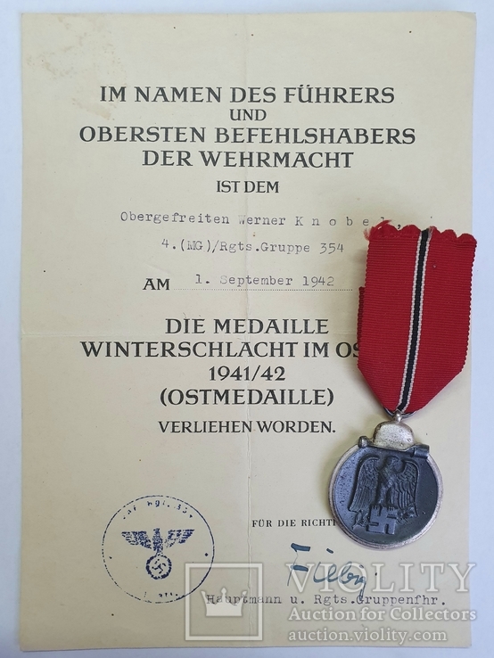 Медаль " За зимнюю компанию на востоке 1941/42" клеймо 56 с документом., фото №2