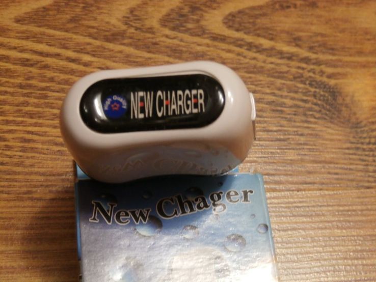 Сетевое зарядное устройство с USB выходом USB New Сharger 1А с подсветкой, фото №3
