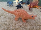 Динозавры, драконы и грифон, фото №4