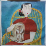 Девушка с котом в плетенном кресле Китай, фото №2