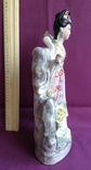 The statuette is a Chinese woman. Porcelain., photo number 8