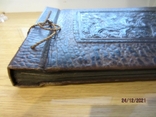 Vintage leather-bound photo album with artistic embossing, photo number 3