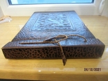Vintage leather-bound photo album with artistic embossing, photo number 4