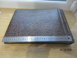 Vintage leather-bound photo album with artistic embossing, photo number 10