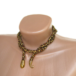 Handmade leopard-colored necklace in the shape of an Ouroboros snake. Predatory print, bright style, photo number 5