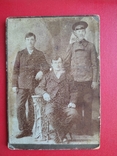 An old photograph of a group of men., photo number 2