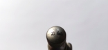 The ballpoint pen is metal, heavy. Engraving in the form of a globe, photo number 4