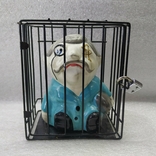 Piggy bank in a cage under lock and key., photo number 5