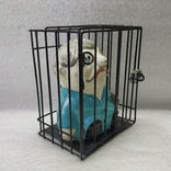 Piggy bank in a cage under lock and key., photo number 6