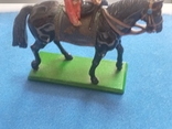 A girl in a military dress uniform on a horse (England)., photo number 9