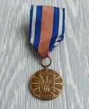 Медаль. За заслуги в охороні громадського порядку / Польща, фото №2