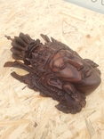 Деревянная маска с изображением божества, фото №7