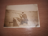 Фото мужчина с охотничьим ружьем в руках(целиться), фото №2