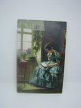 Открытка Девушка в бирюзовом платье читает книгу перед окном, фото №2
