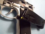 Фирменный страйкбольный пистолет и упаковка пулек, фото №11