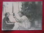 Девочка с бабушкой держащей мишку, фото №2