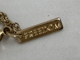 Золотистое ожерелье с кулоном  от английского производителя Freedom, фото №5