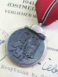 Медаль " За зимнюю компанию на востоке 1941/42" клеймо 56 с документом., фото №5