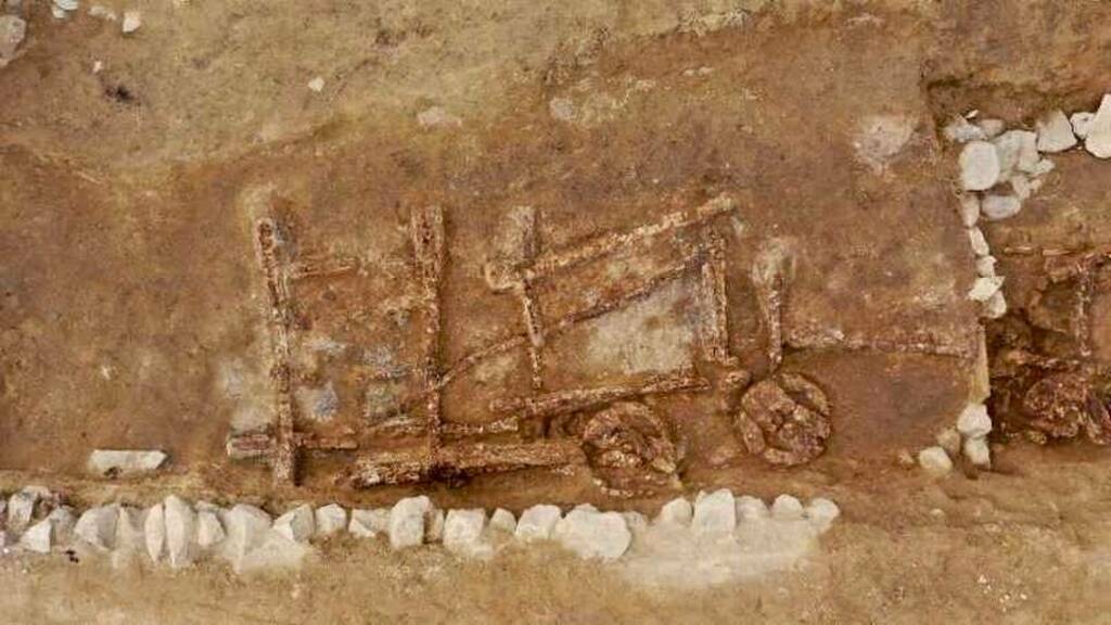 Parts of the cart discovered during excavations. Photo: Xinjiang Institute of Cultural Relics and Archaeology