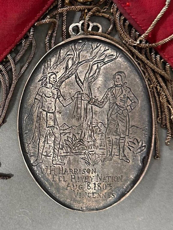 Oval silver peace medal with hand-engraved scenes on obverse and reverse, valued at ,000–,000.
